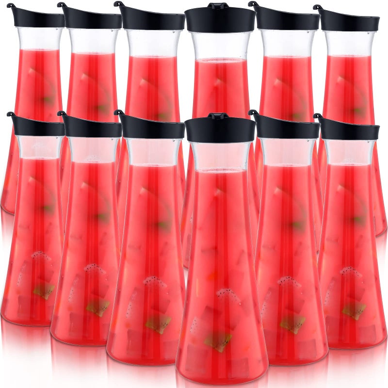 Xinnun Xinnun 12 Pcs Clear Water Carafe with Flip Top Lid 34 oz Plastic Juice Pitchers Beverage Containers for Mimosa Bar Milk Iced Cold Drinks Lemonade Water Carafe for Home Restaurant School 