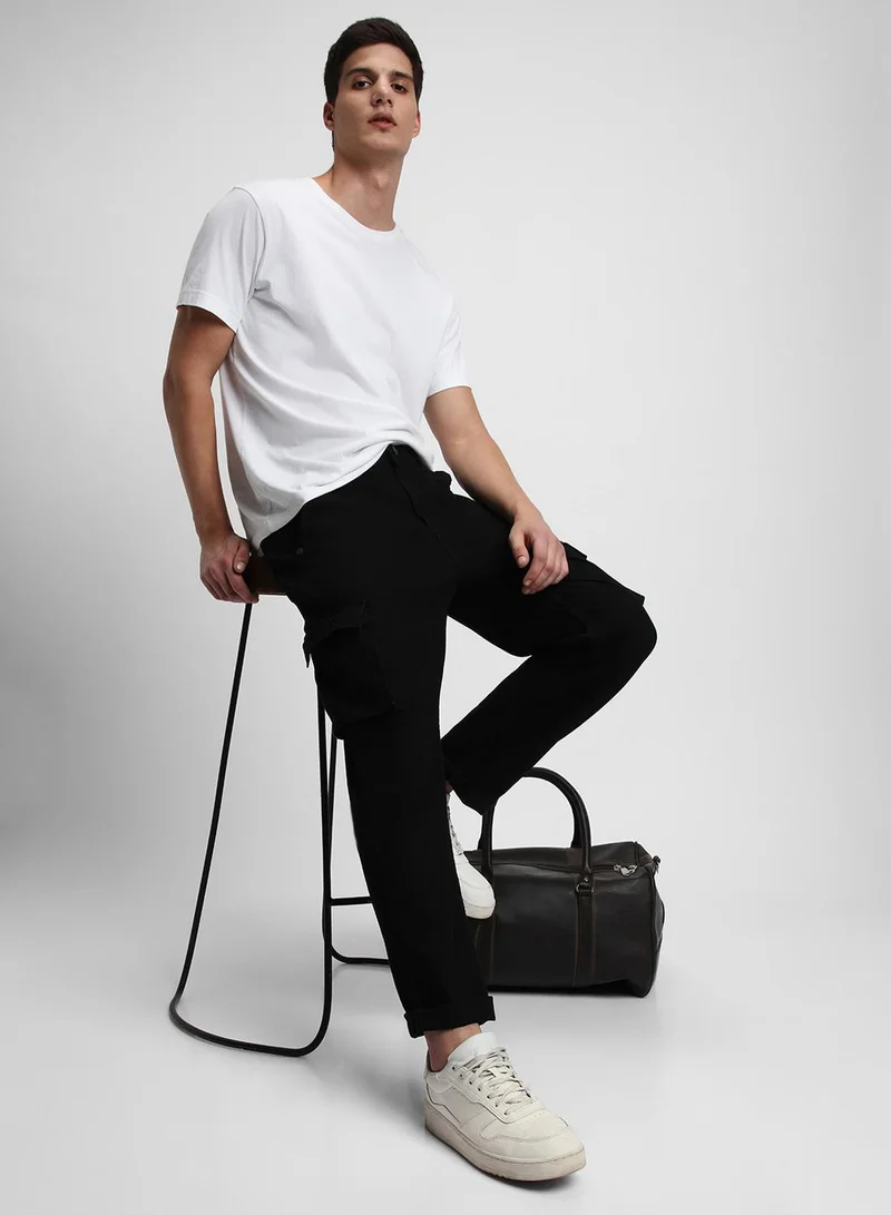 دينيس لينغو جينز رجالي أسود قطن مدمج سادة طويل بقصّة الكارجو