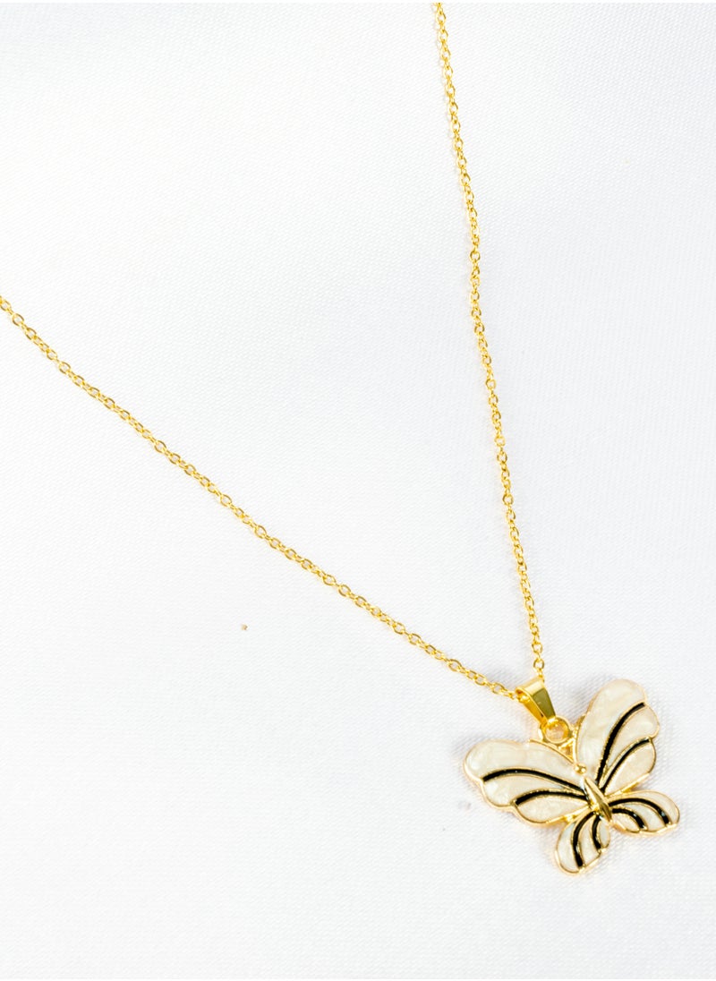 The Black Pearl Accessories - Stainless Steel Neckalce Gold with a White Butterfly Pendant - Image 1