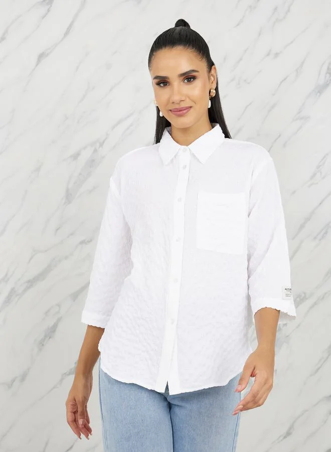 ستايلي Oversized Textured Curved Hem Shirt with Patch Detail