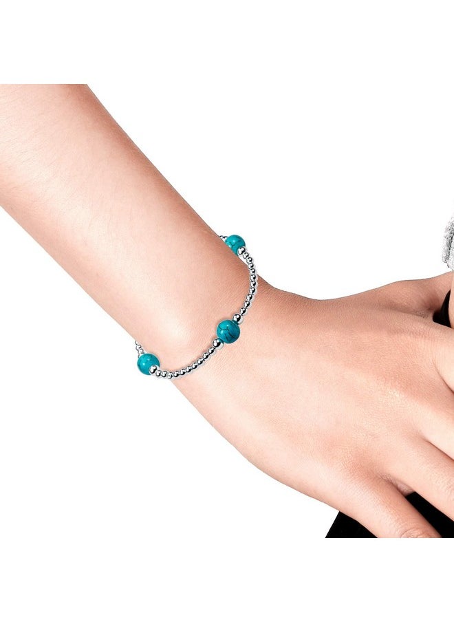 AeraVida - Galactic Round Simulated Turquoise Elastic Sterling Silver Bead Stretch Bracelet | Stylish, Elegant, And Unique Women'S Fashion Jewelry Accessory - Image 1