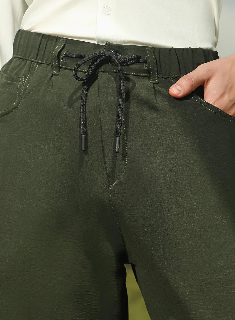 Campus Sutra Men's Sacramento Green Tapered Tailored Trousers