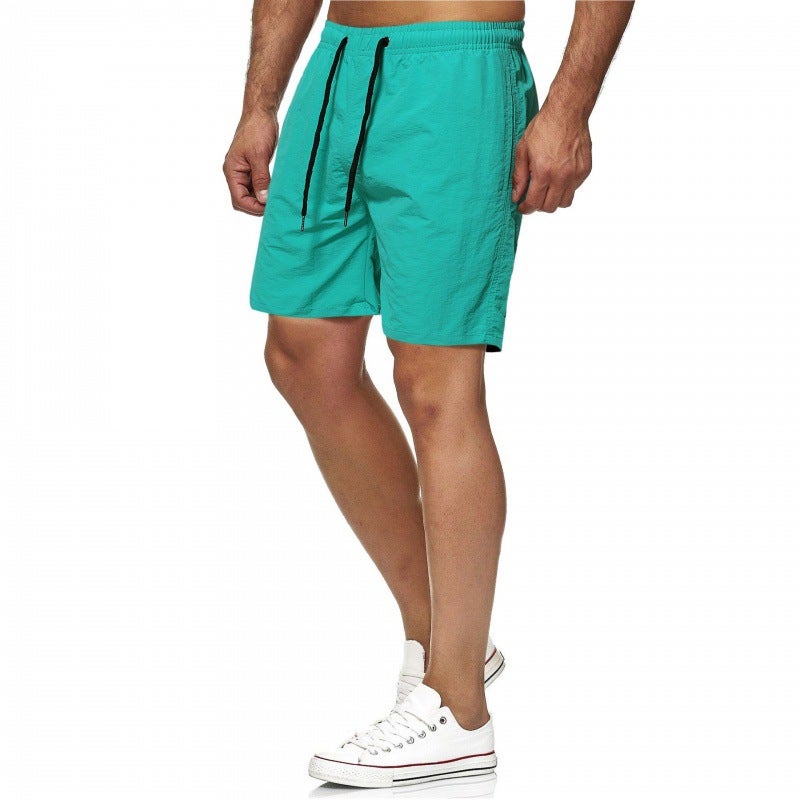 2021 foreign trade mens Joker five-point quick-drying solid color beach pants mens sports fitness shorts K01-special P13 mint green 