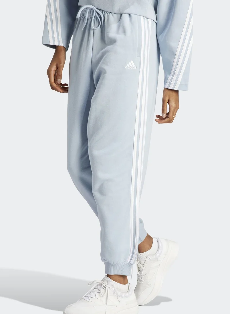 adidas بنطال جوغر أساسي بقصة فضفاضة وشعار الماركة