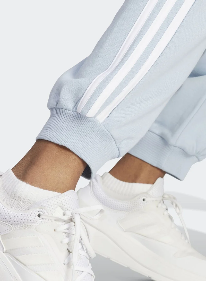adidas بنطال جوغر أساسي بقصة فضفاضة وشعار الماركة