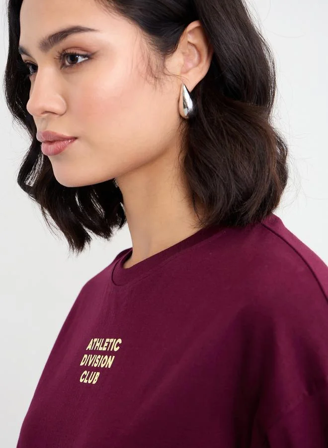 Styli Styli Oversized Athletic Club Slogan T-Shirt with Dropped Shoulder