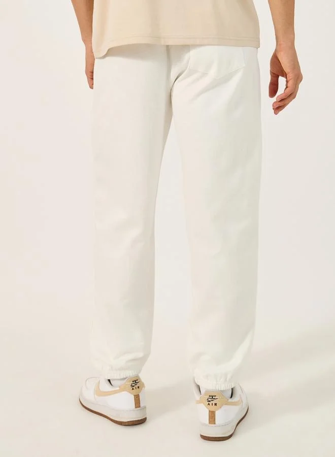 Styli Fleece Mid Rise Relaxed Fit Joggers with Badge Detail