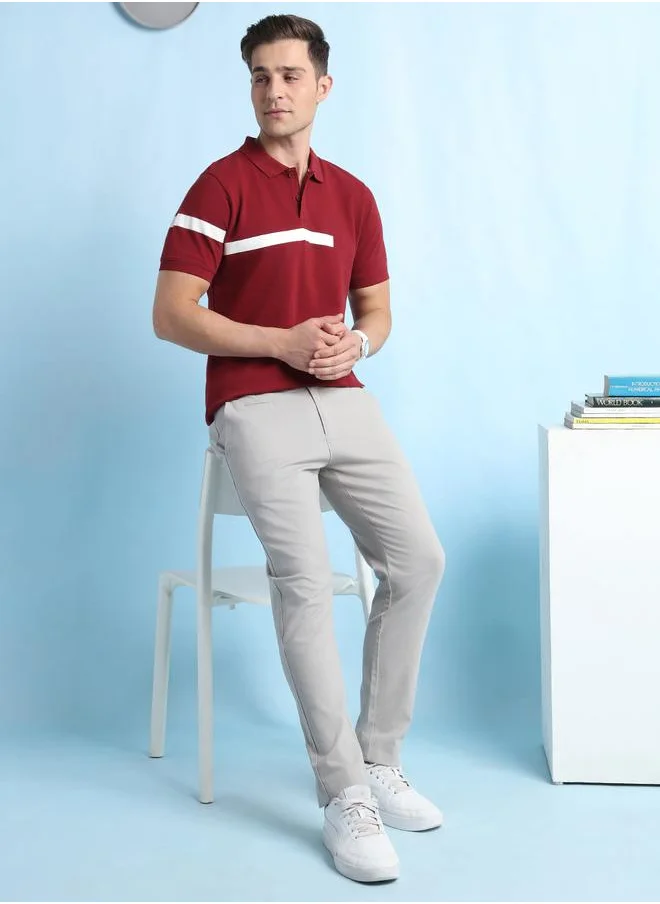 دينيس لينغو Cabernet Striped Polo T-Shirt for Men featuring a wide printed stripe design, classic polo neckline, and premium pique fabric for a bold and stylish appeal.