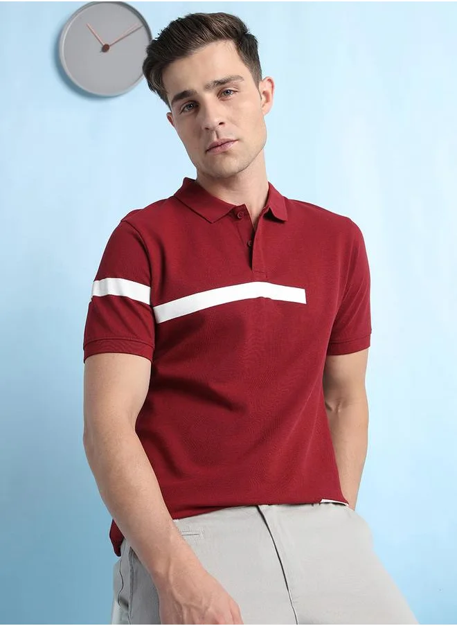 دينيس لينغو Cabernet Striped Polo T-Shirt for Men featuring a wide printed stripe design, classic polo neckline, and premium pique fabric for a bold and stylish appeal.