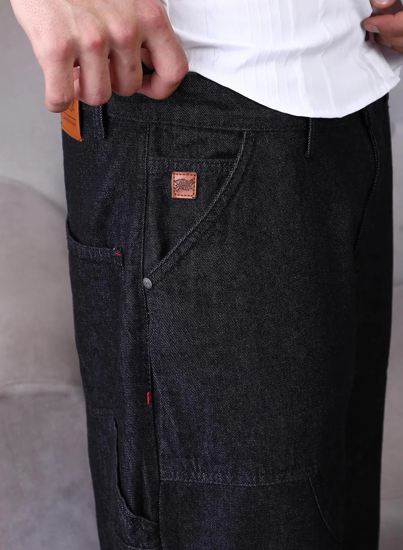 Campus Sutra Campus Sutra Men's Dark Blue Patched Straight Denim Jeans For Casual Wear | Mid-Rise | Straight Fit | Button Closure | Denim Jeans Crafted With Comfort Fit For Everyday Wear