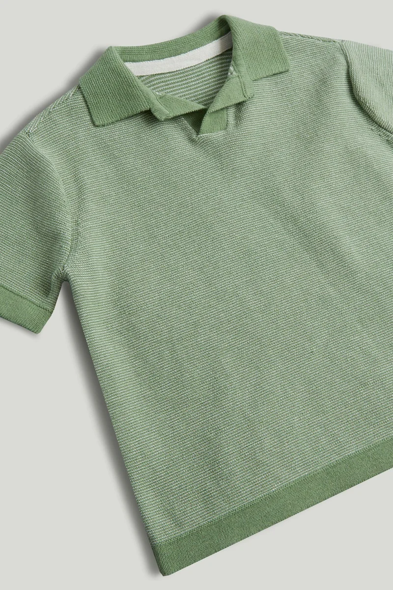 مذركير قميص بولو أخضر محبوك