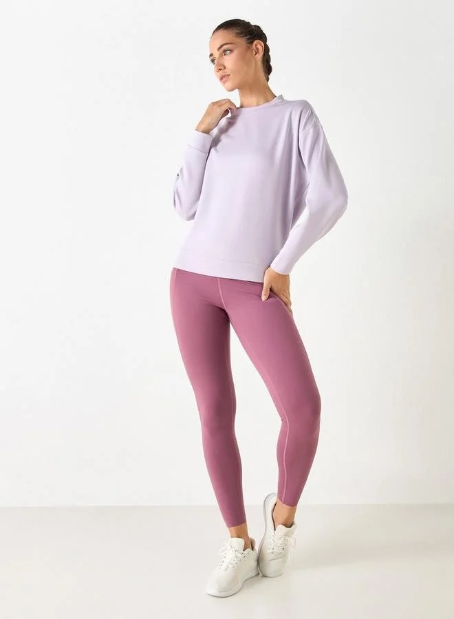 ادوت من سبلاش سويت شيرت بياقة دائرية وأكمام طويلة