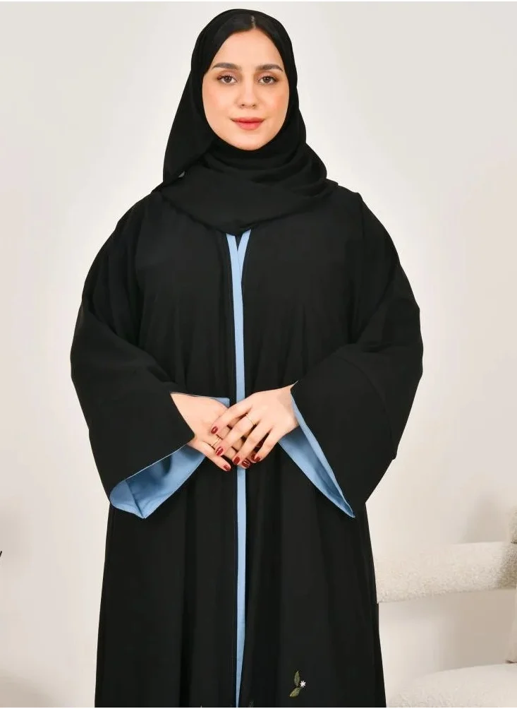 lamha abaya Elegant quarter-cloche abaya with wide sleeves and embroidery at the bottom of the abaya