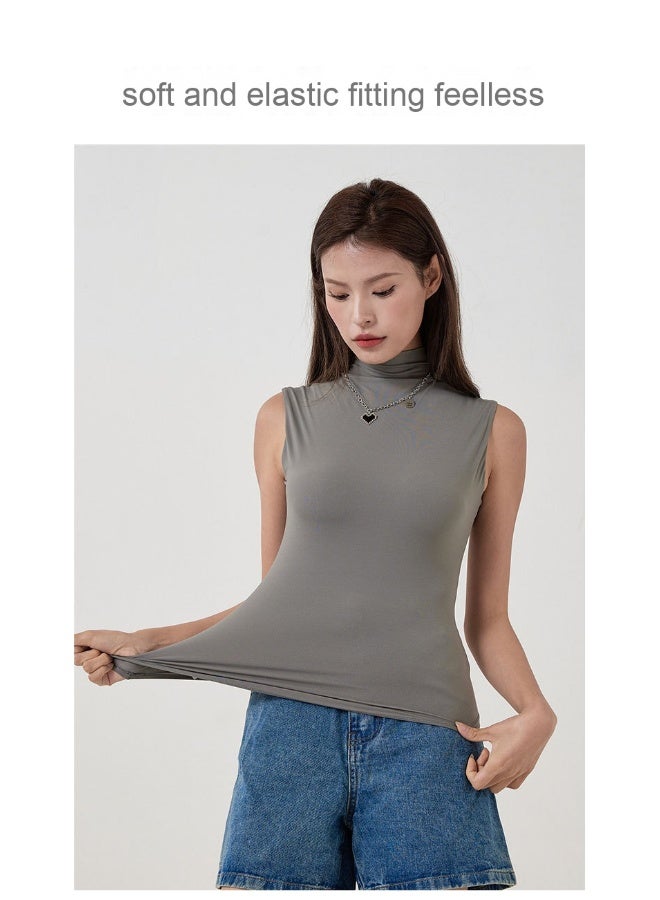 بلوزة بدون أكمام عالية الياقة بتصميم مزدوج ومرنة، تناسب الجسم وتظهر القوام رشيقًا - Image 2