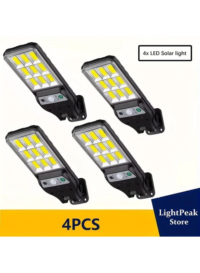 4 قطع أضواء LED خارجية تعمل بالطاقة الشمسية مع حساس حركة لإضاءة الجدران الأمنية - Image 1