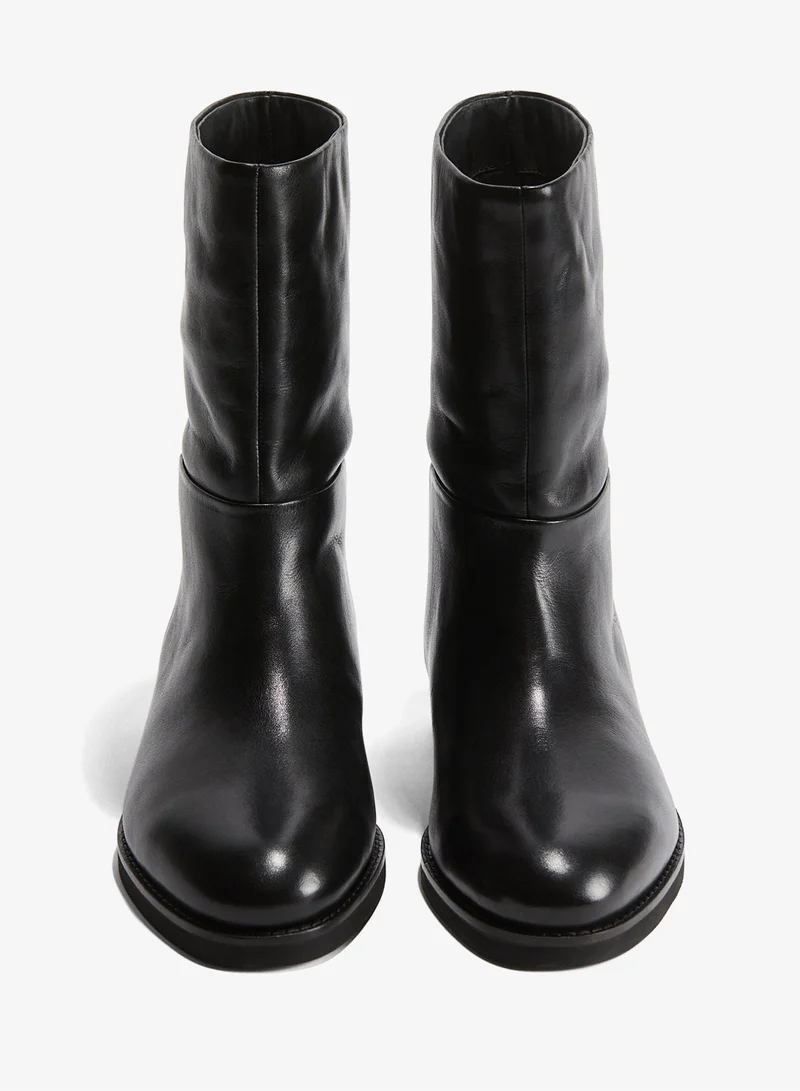 اتش اند ام بوت جلدي بطول الساق