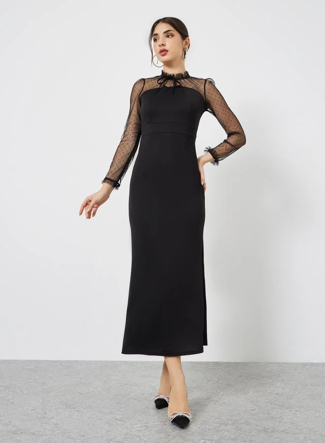 ستايلي فستان طويل بحافة ميرميد وأكمام شبكية