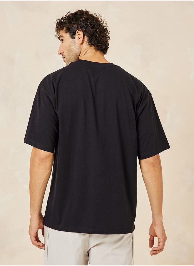 Styli - Minimal Chest HD Text Slogan Oversized T-Shirt - Image 1