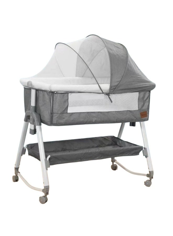Portable Baby Bassinet with Protective Mosquito Net and Storage Basket - Foldable Infant Crib with Locking Wheels