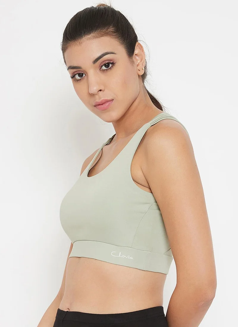 Clovia Green Clovia Medium Impact Padded Racerback Sports Bra in Sage Green for Women | Best Price UAE
