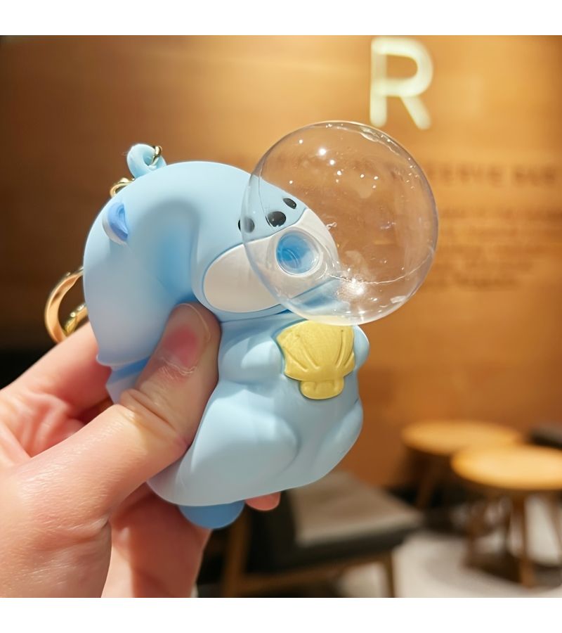 Pink Raccoon Bubble Toy Relieves Stress Cube Sensory for Keychain Backpack - Image 1