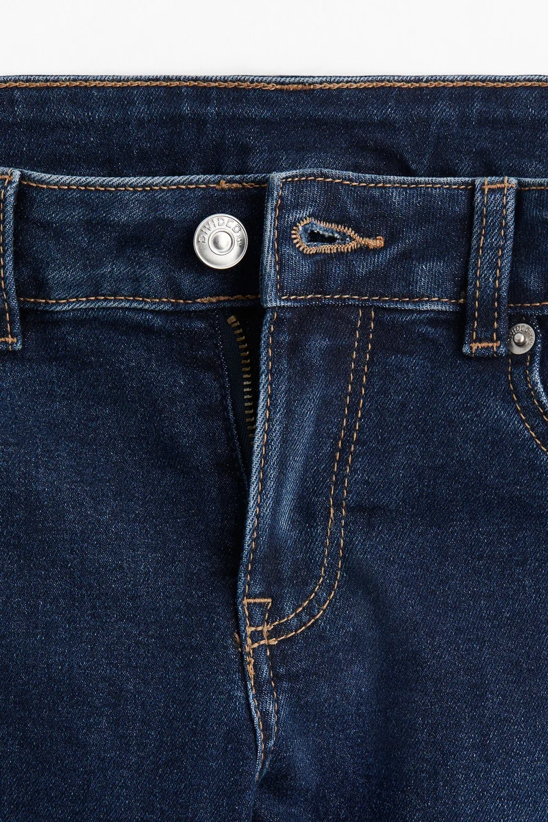 اتش اند ام جينز بحافة واسعة وبطول الكاحل بتصميم خصر منخفض