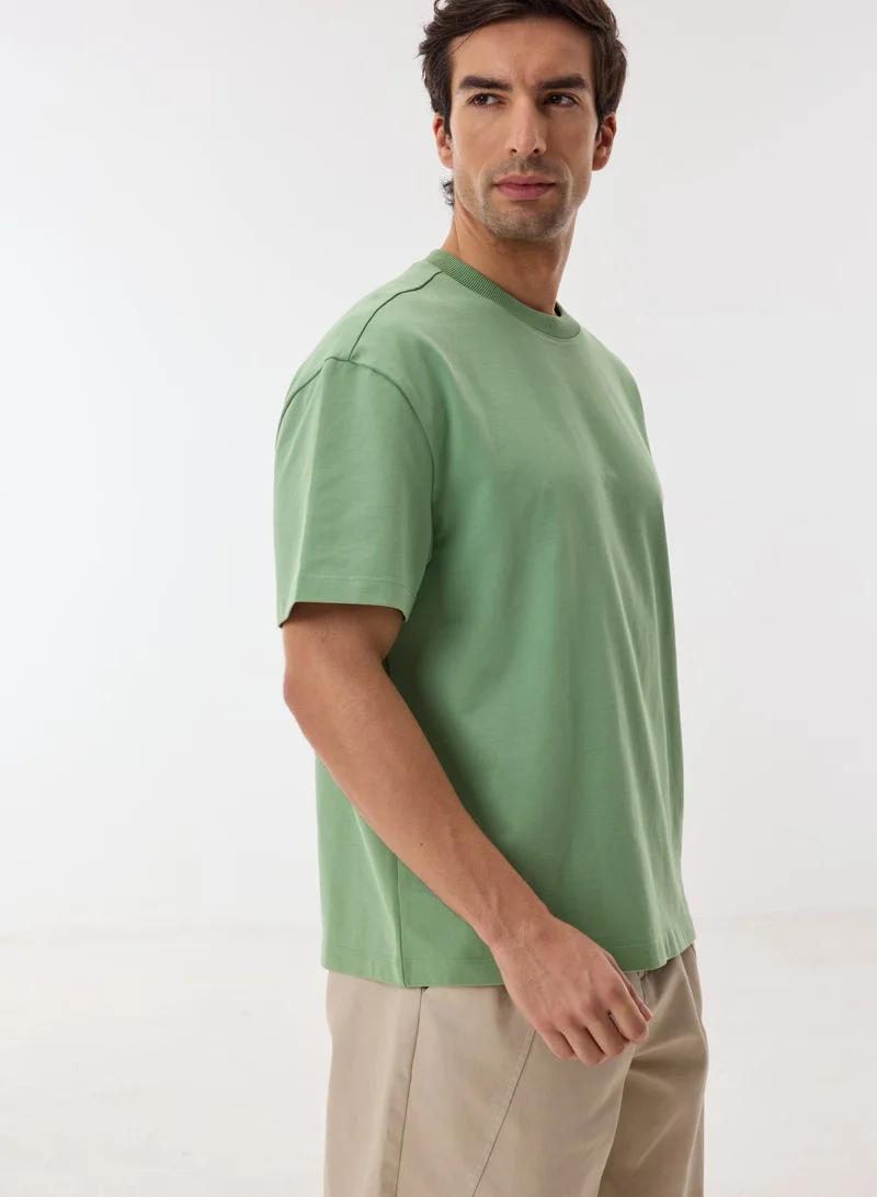 Ashita Fernandes  Premium Sage Green Oversized Cotton T-Shirt for Men | Best Price UAE