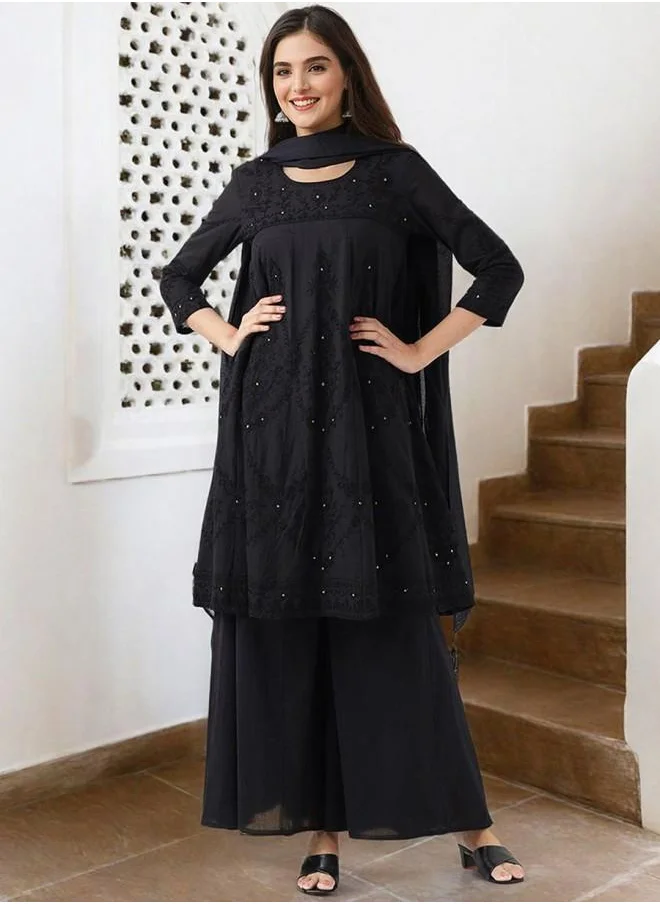 آي شين Embroidered Women Black Cotton Kurta Set with Embroidered pattern Tunic and Palazzo features a Round neckline and Three-Fourth Sleeve secured with Elastic closure and styled in Straight Fit ideal for Festive moments — crafted to elevate your special moments.