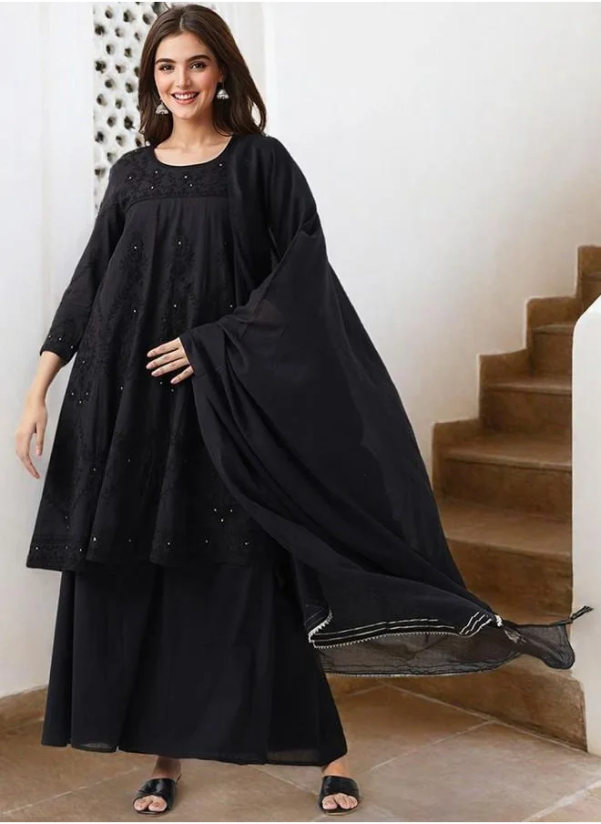 ISHIN Embroidered Women Black Cotton Kurta Set with Embroidered pattern Tunic and Palazzo features a Round neckline and Three-Fourth Sleeve secured with Elastic closure and styled in Straight Fit ideal for Festive moments — crafted to elevate your special moments.