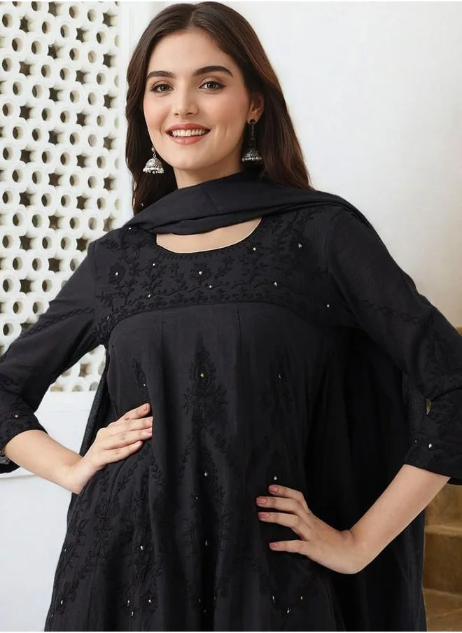 ISHIN Embroidered Women Black Cotton Kurta Set with Embroidered pattern Tunic and Palazzo features a Round neckline and Three-Fourth Sleeve secured with Elastic closure and styled in Straight Fit ideal for Festive moments — crafted to elevate your special moments.