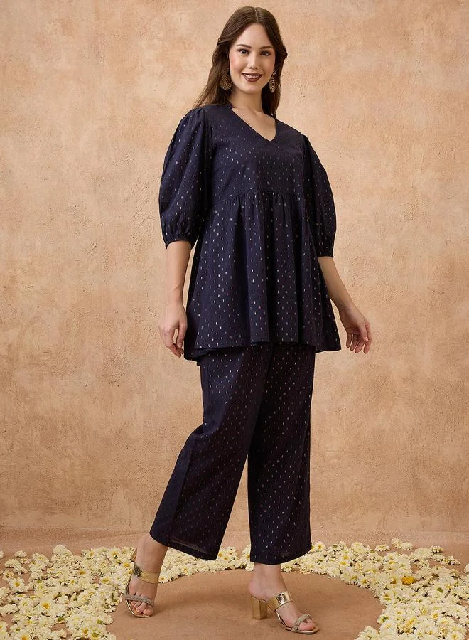 جلو باص طقم منسق من بنطال وتونيك