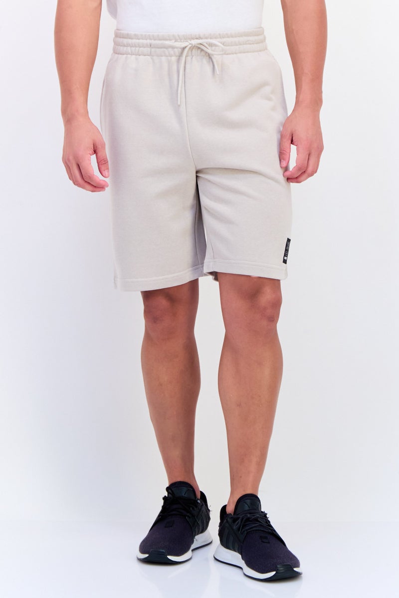 RBX شورتات رياضية للرجال برباط سحب للخارج، لون بني رملي - Image 1