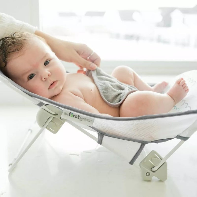 The First Years Sure Comfort Folding Baby Bather - Foldable Baby Bath Seat and Lounger for Home or On the Go - for Sink or Tub Use - Non-Slip Seat - For Up to 15 Lbs - Image 2