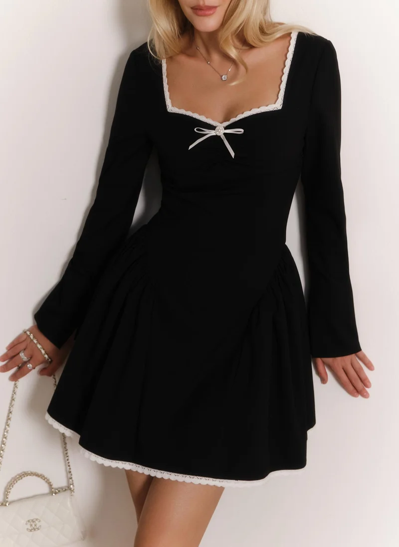 Lichi Mini dress with contrasting trim and bow