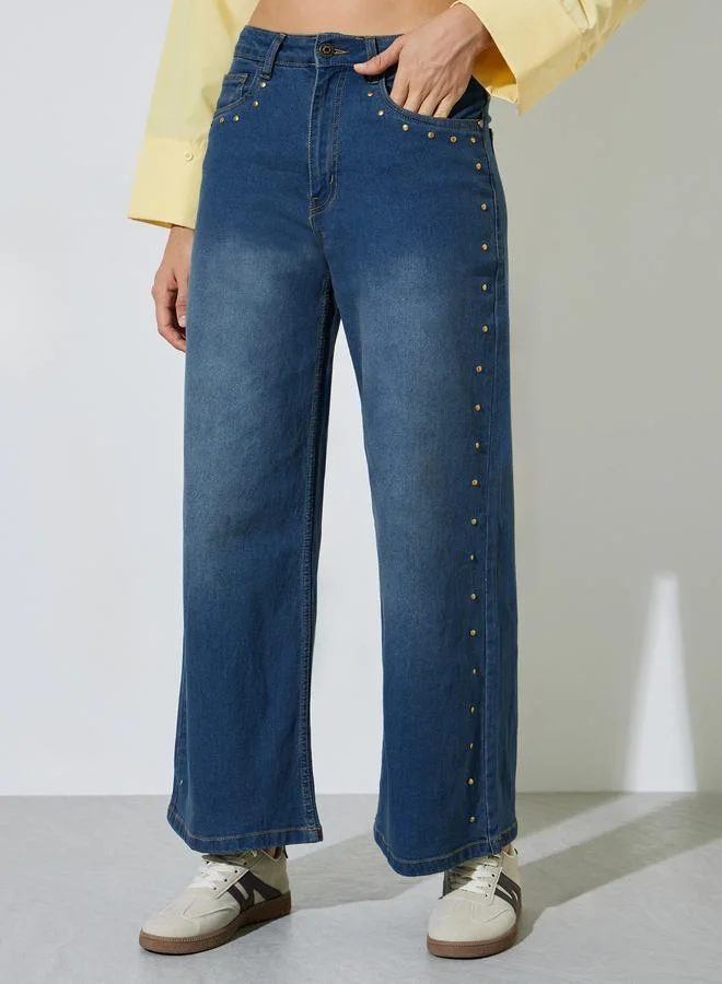 ستايلي Dark Blue Wide Leg Jeans with Washed Effect and Brass Studded Seams