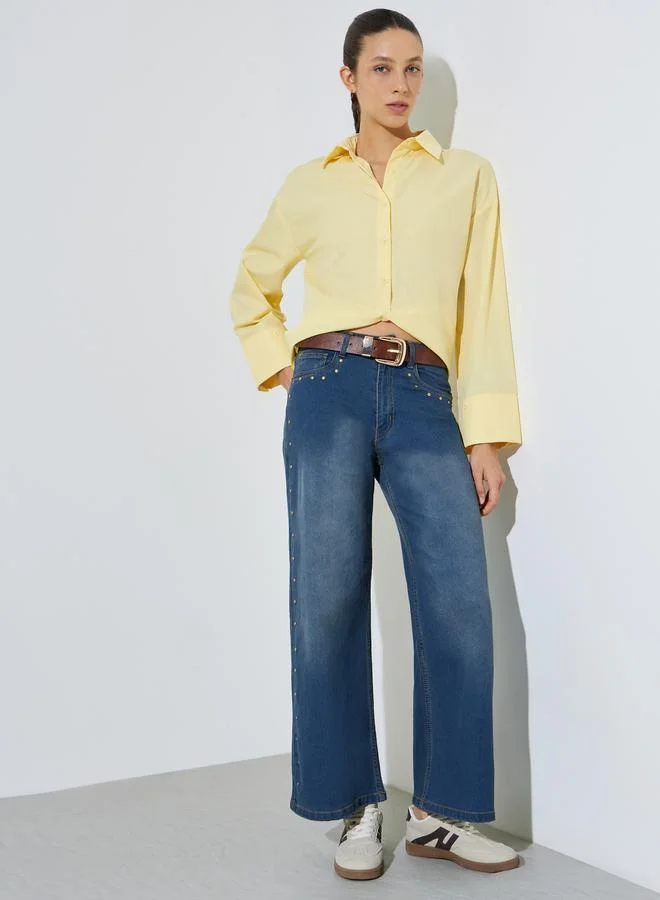 ستايلي Dark Blue Wide Leg Jeans with Washed Effect and Brass Studded Seams