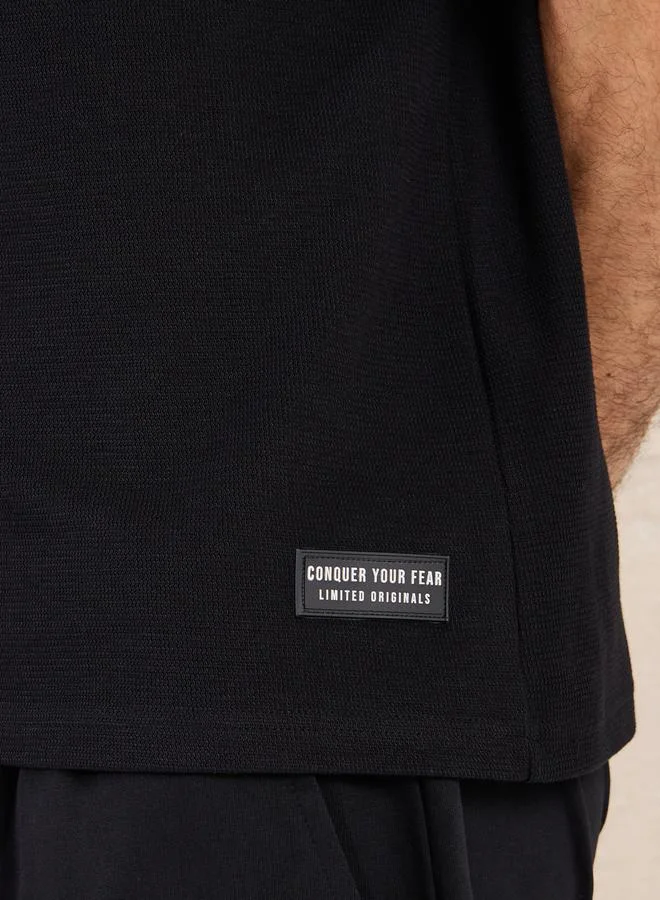 Styli Solid Badge Detail Oversized T-Shirt