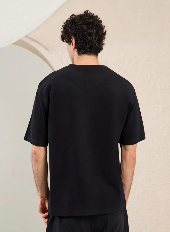 Styli Solid Badge Detail Oversized T-Shirt