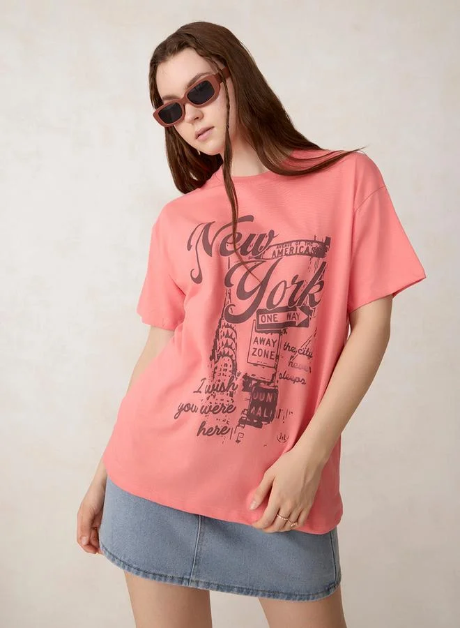 Outzidr  Pink Graphic Oversized T-Shirt - 100% Cotton for Women | Best Price UAE