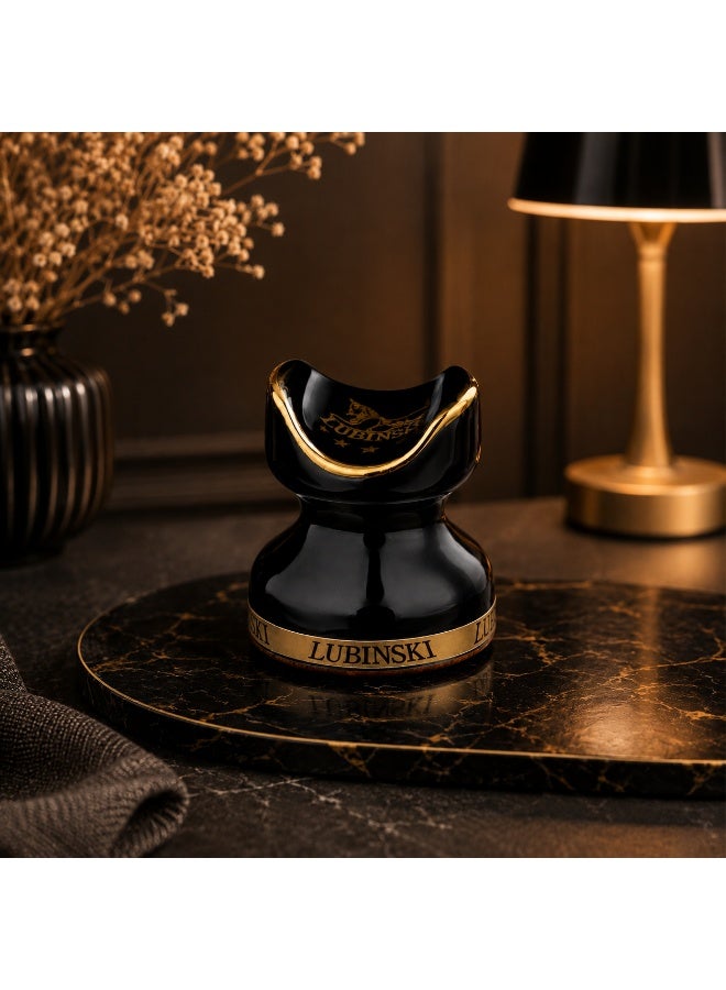 A luxurious cigar holder with a distinctive design made of polished ceramic, combining luxury and practicality. Adorned with gold detailing for a touch of sophistication, it's the perfect piece to elevate your cigar-smoking experience. - Image 1