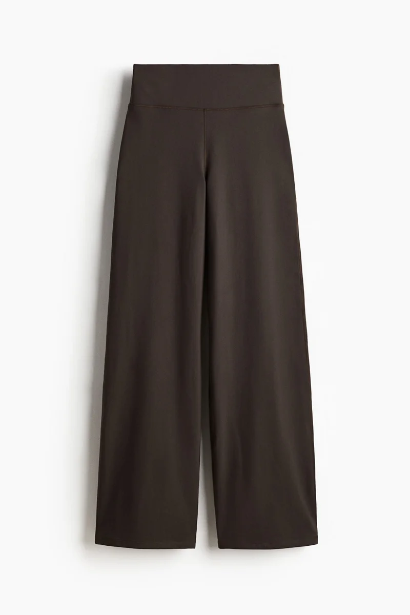 H&M SoftMove™ Flared sports trousers