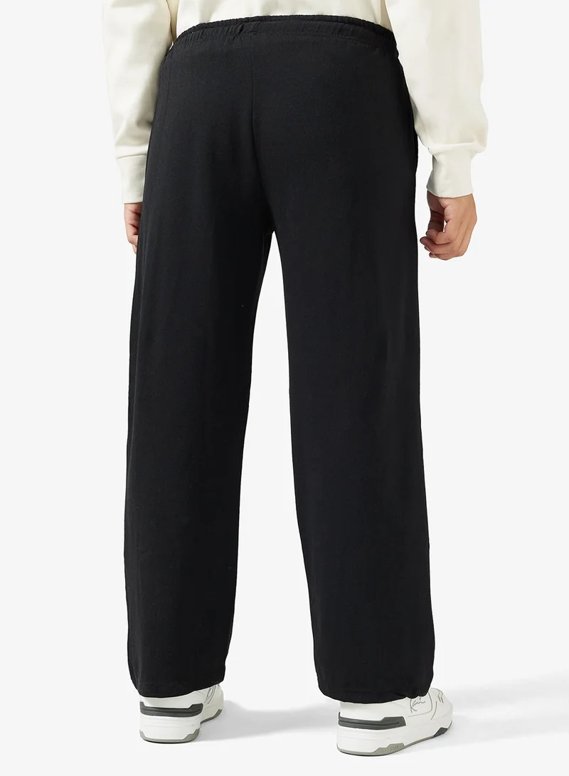 Seventy Five Basics  Text Print Open Hem Joggers for Men | Best Price UAE