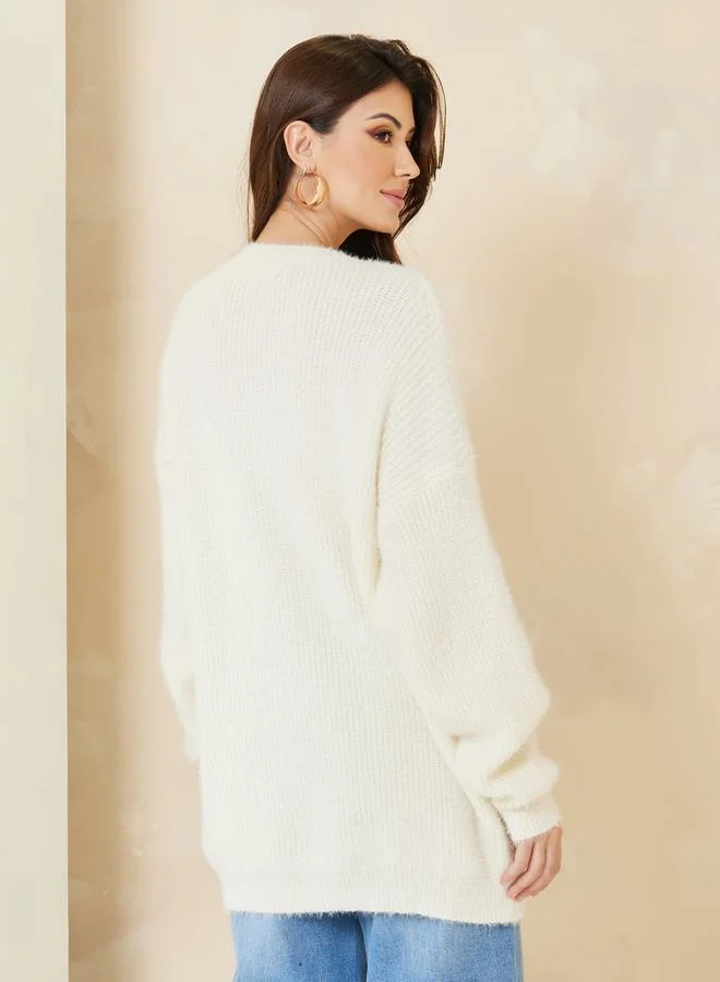 ستايلي Oversized Longline Fuzzy Yarn Sweater