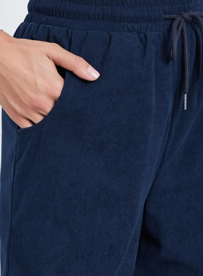 Styli Women Dark Blue Solid Corduroy Wide Leg Pants