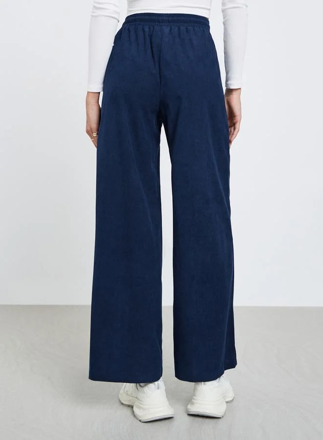 Styli Women Dark Blue Solid Corduroy Wide Leg Pants