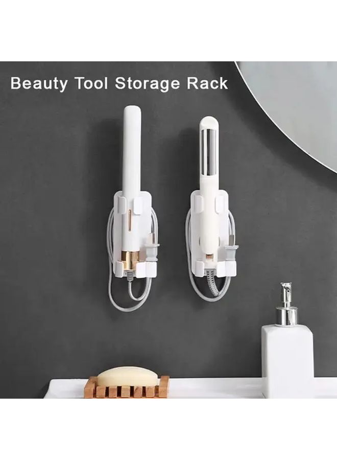 Black Wall Mounted Hair Dryer Holder With Golden Accents - Image 1