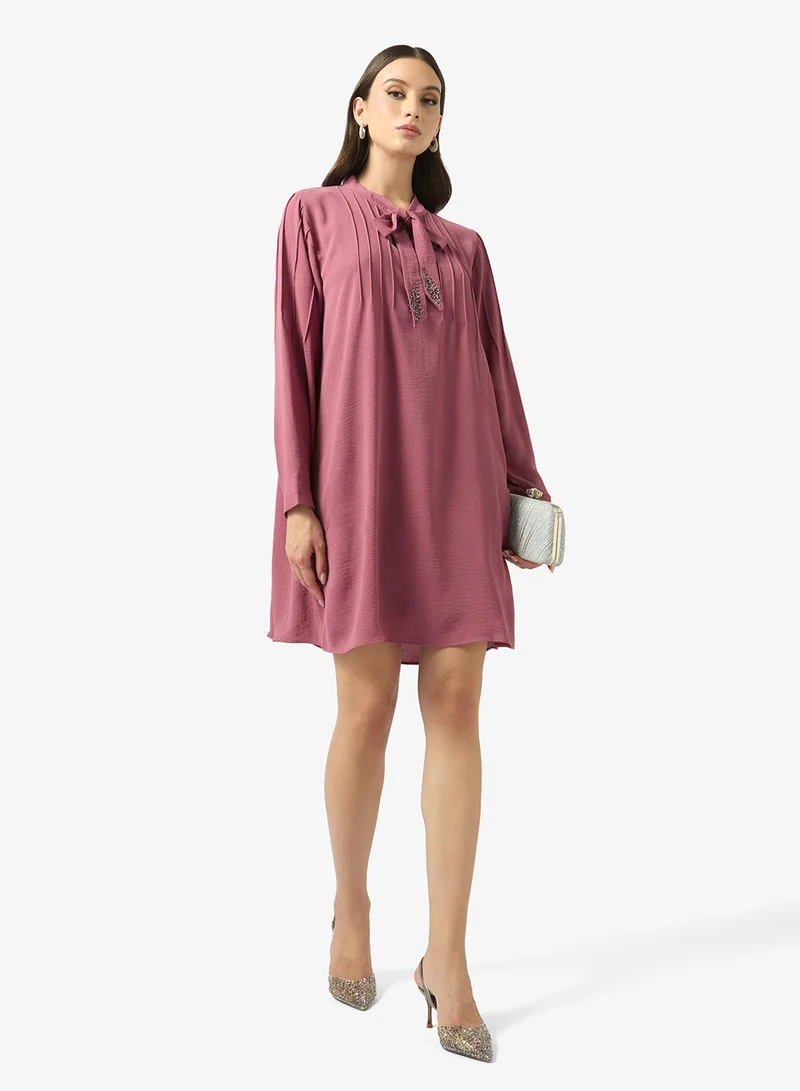 FYOR  Mauve Bow Neck Mini Dress for Women | Best Price UAE
