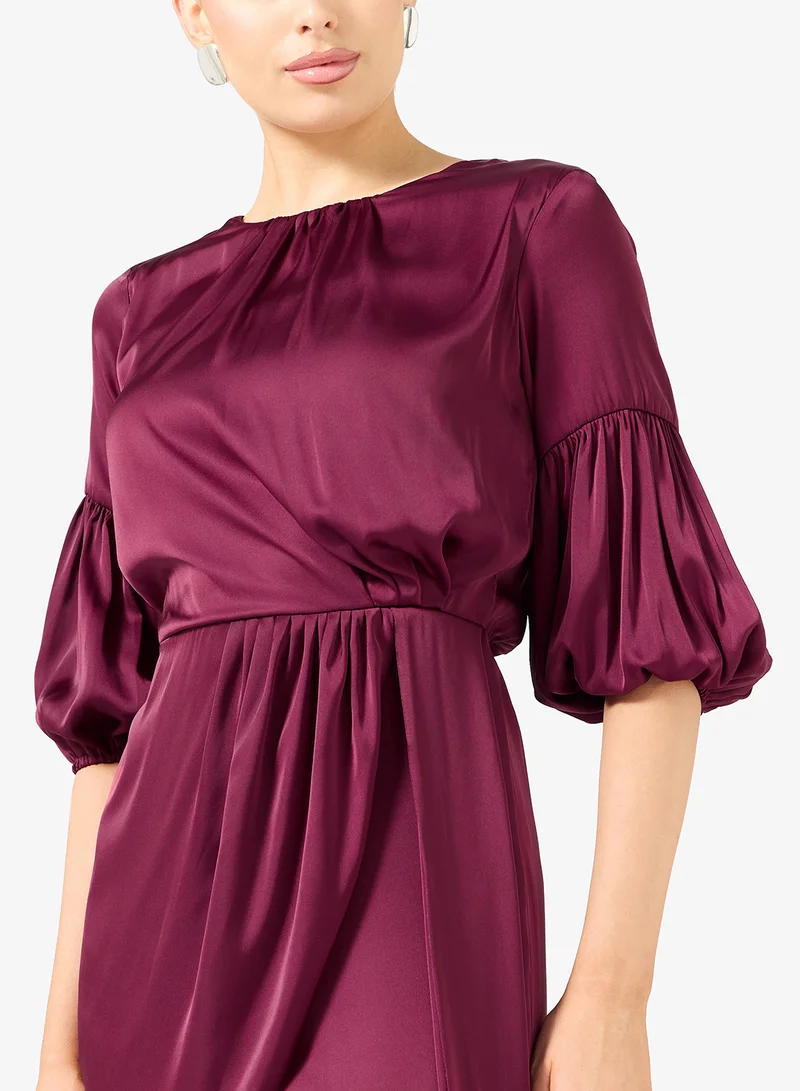 رينيه فستان قصير بفيونكة جانبية دراماتيكية