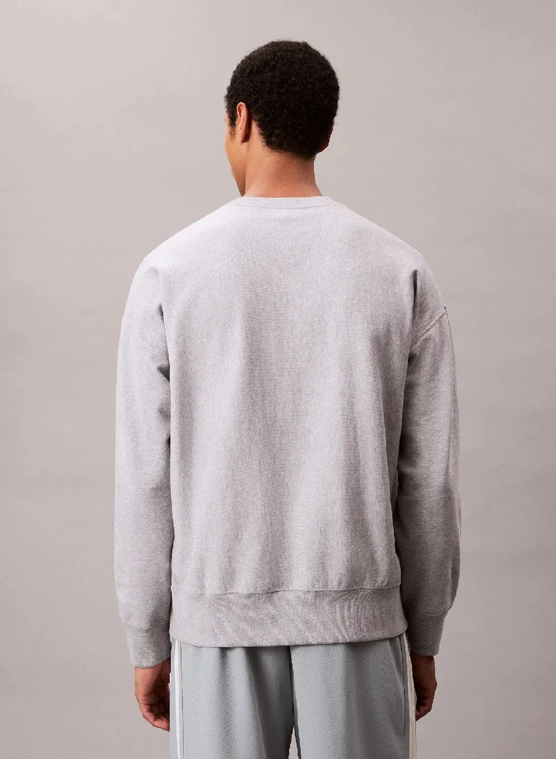 Calvin Klein Jeans  Relaxed Graphic Logo Sweatshirt for Men | Best Price UAE