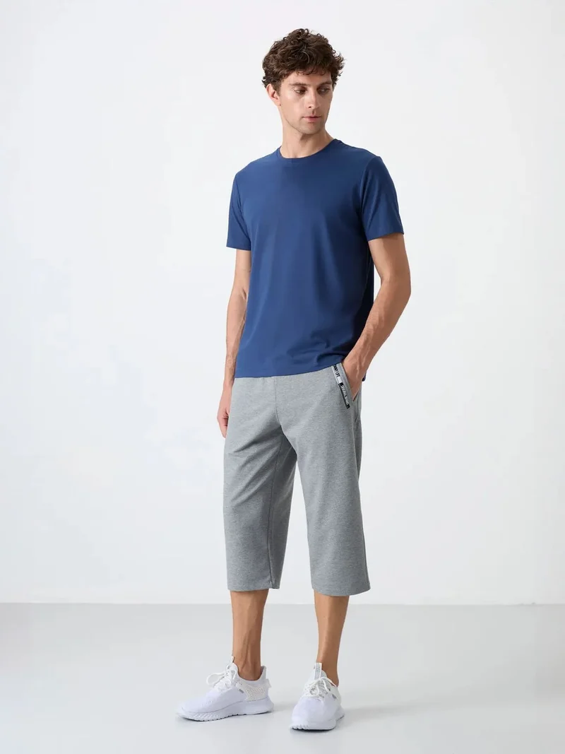 تومي لايف TOMMY Men's Mid-Waist Capri Shorts